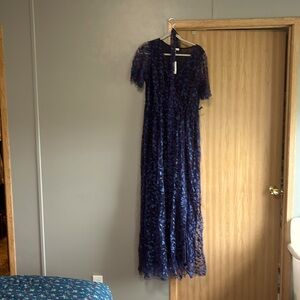 Beautiful full length dress.  Could be worn to a dance or a bridesmaid dress!